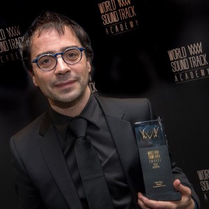 Michel holding World Soundtrack award